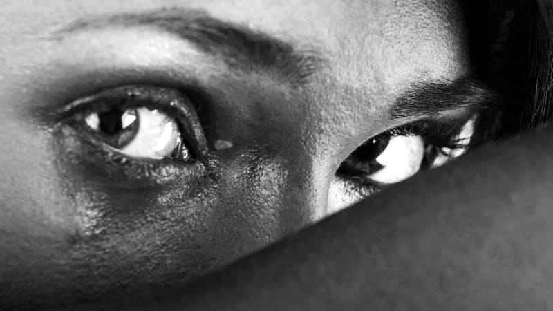 Close-up of a vulnerable woman's eyes, illustrating an emotionally abusive relationship Close-up of a vulnerable woman's eyes, illustrating an emotionally abusive relationship
