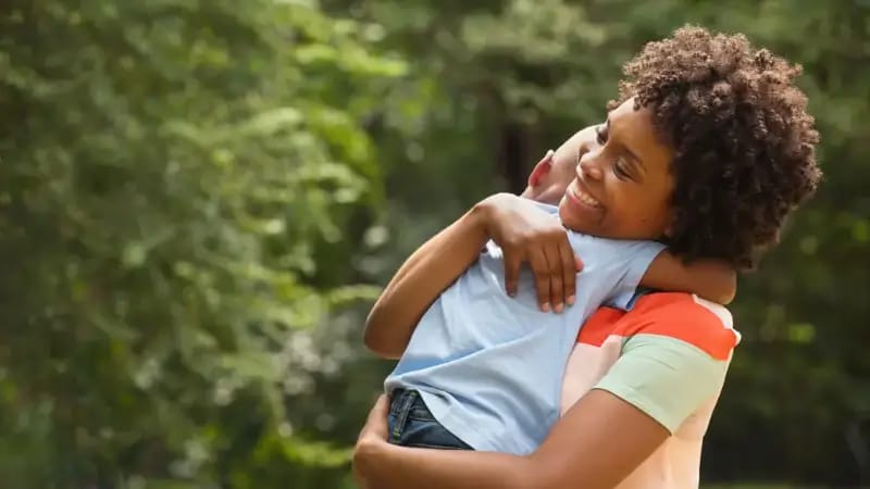 Mother holding her child